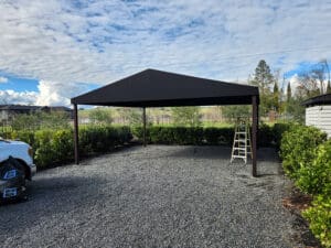 Custom black awning in parking lot