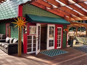 Custom green awning with red trim