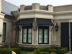 Custom black awning with white trim