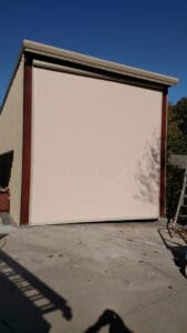 Custom vertical curtain on a steel building