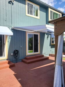 Retractable awning on a back door