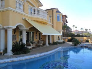 Polar Shades Retractable Awning Over Pool Lounge Area