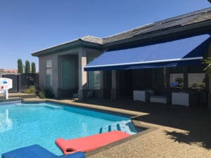 Polar Shades Retractable Awning Over Pool Lounge Area