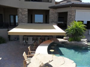 Polar Shades Retractable Awning Over Poolside Bar Area