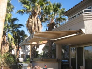 Polar Shades Retractable Awning Over Outdoor Grill Area