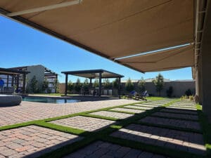 Polar Shades Retractable Awning Next To Pool Lounge Area