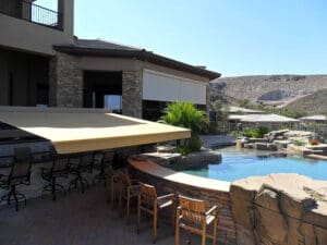 Polar Shades Retractable Awning Over Outdoor Bar Area