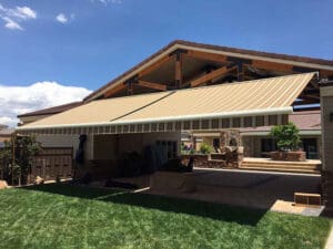 Polar Shades Retractable Awning Over Backyard Area