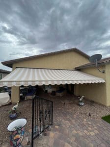 Polar Shades Retractable Awning In Backyard