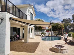 Polar Shades Retractable Awning In Backyard Pool Area