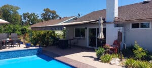 Polar Shades Retractable Awning Over Pool Lounge Area