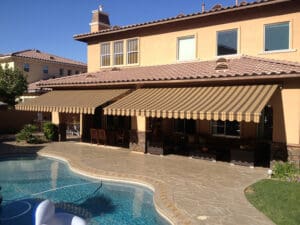 Polar Shades Retractable Awning Over Pool Lounge Area