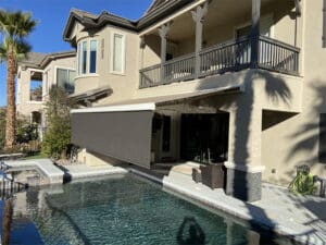 Polar Shades Retractable Awning Over Pool Lounge Area