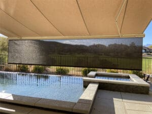 Polar Shades Retractable Awning Over Pool Lounge Area